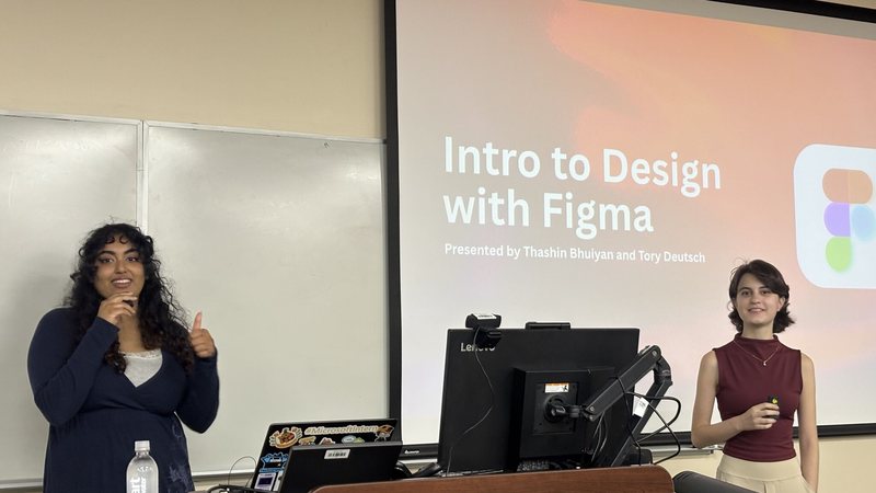 Thashin Bhuiyan and Tory Deutsch presenting Intro to Design with Figma at a Knight Hacks workshop